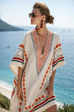Women's loose fit summer beach dress by FJØRNA, lightweight, short-sleeved, perfect for warm weather and casual outings.