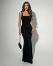 Black satin maxi dress for women by FJØRNA featuring a sleek silhouette and subtle animal print design.