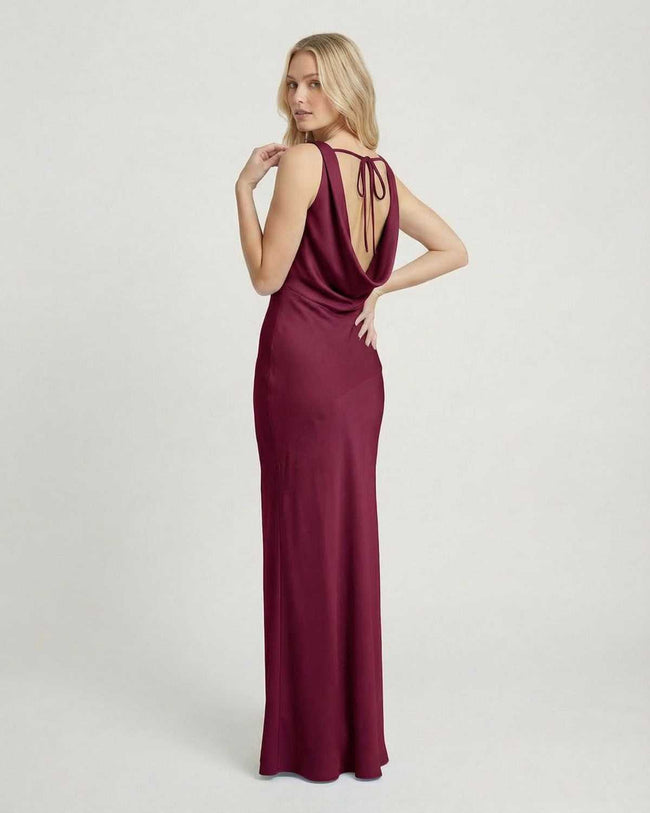 Maroon satin maxi dress for women by FJØRNA featuring a cowl neck, sleeveless design, and bodycon silhouette for elegant evening wear.