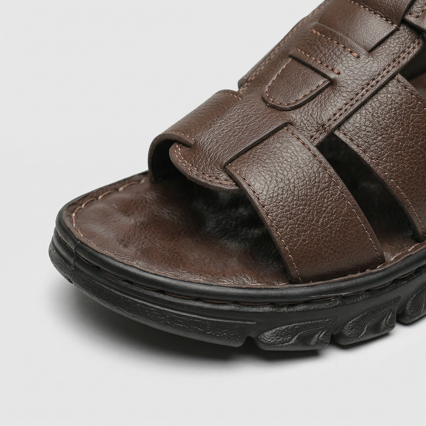 FJØRNA men's open toe strap leather sandals showing the stylish design and adjustable straps on a neutral background.
