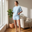 FJØRNA women's summer two-piece co-ord set with drawstring details, styled casually outdoors in a lifestyle setting.