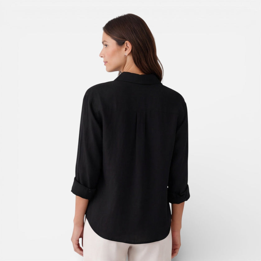 FJØRNA women's linen cotton blend shirt with relaxed summer fit, breathable fabric, and casual style, shown on a model.