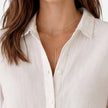 Women's linen cotton blend shirt by FJØRNA, relaxed summer fit, breathable fabric, short sleeves, casual stylish top.