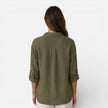 Women's linen and cotton blend shirt by FJØRNA, showcasing a relaxed summer fit and breathable fabric in a natural linen color.