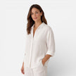 Women's linen cotton blend shirt by FJØRNA, showing a relaxed summer fit with breathable, lightweight fabric and casual style.