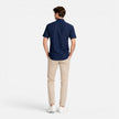 Men's FJØRNA linen shirt with short sleeves, breathable cotton blend fabric, button-up design, ideal for warm weather.