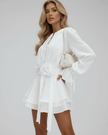 FJØRNA floral mini dress for women featuring 3D floral design, belt, flare sleeves, and bodycon fit in white fabric.