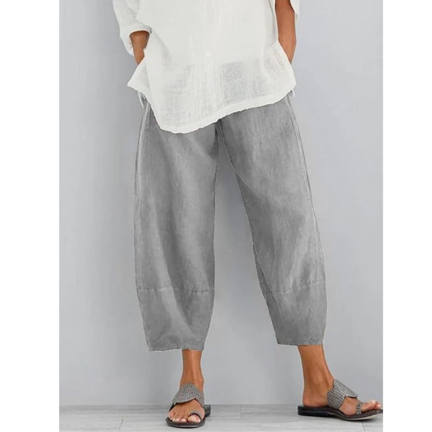 FJØRNA women's lightweight summer tapered harem pants with elastic waist and breathable fabric, cropped for a relaxed fit.