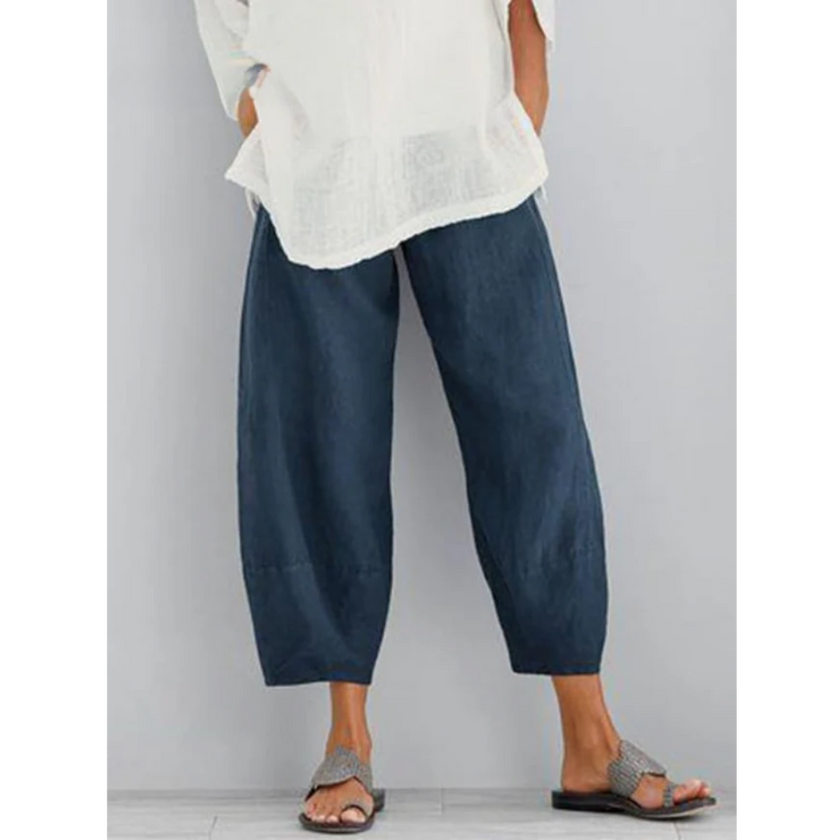 FJØRNA women's lightweight summer trousers with tapered elastic waist and breathable fabric, cropped harem style pants.