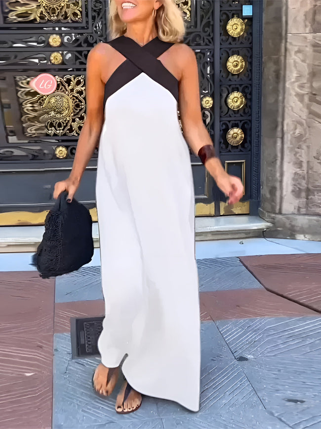 FJØRNA white dress with flowing fabric, sleeveless design, and elegant fit, perfect for casual or summer wear
