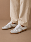 FJØRNA men's low-top suede sneakers with lightweight casual design, featuring tan suede uppers and white rubber soles.