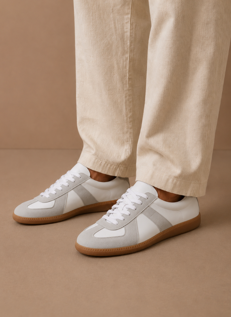 FJØRNA men's low-top suede sneakers with lightweight casual design, featuring tan suede uppers and white rubber soles.
