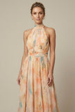 FJØRNA women's floral halter neck maxi dress with tie back, perfect for wedding guests, featuring a flowy floral design.
