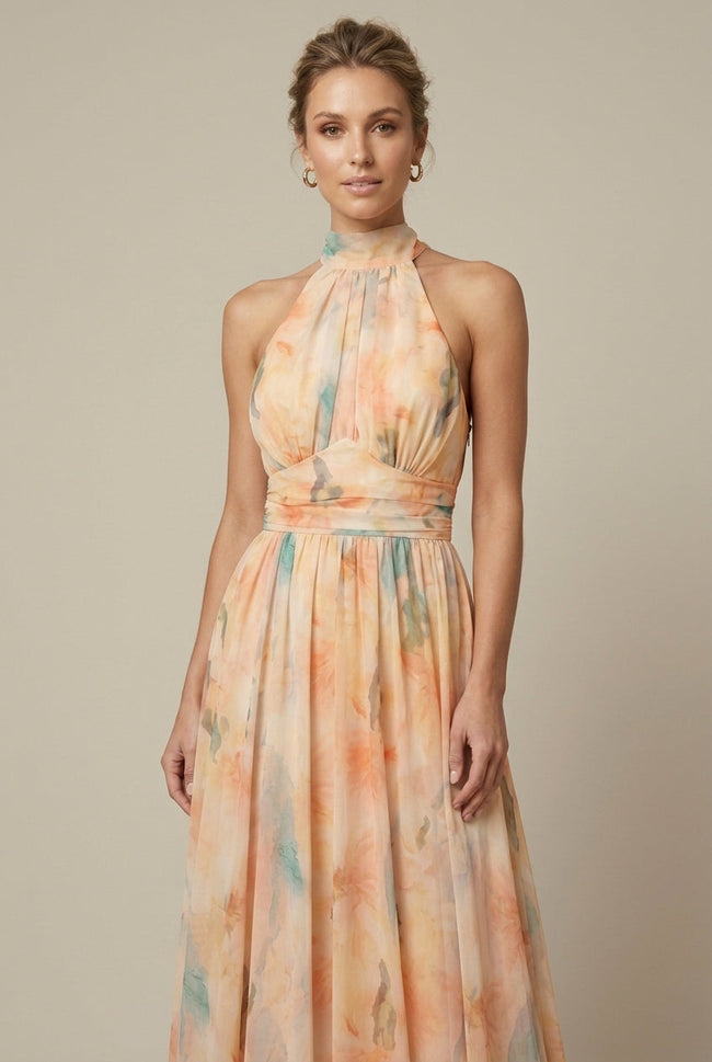 FJØRNA women's floral halter neck maxi dress with tie back, perfect for wedding guests, featuring a flowy floral design.
