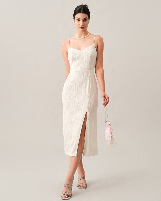 Red FJØRNA midi dress for women with textured fabric and pearl strap details, stylish and elegant for various occasions.