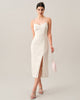 Red FJØRNA midi dress for women with textured fabric and pearl strap details, stylish and elegant for various occasions.