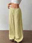 FJØRNA Mirabelle women's wide-leg casual pants with drawstring waist, relaxed fit, in soft fabric, perfect for everyday wear.