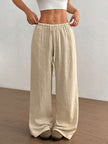 FJØRNA Mirabelle women's wide-leg casual pants with drawstring waist, relaxed fit, and lightweight fabric.