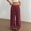 FJØRNA Mirabelle women's wide-leg casual pants with drawstring waist, lightweight fabric and relaxed fit, shown in neutral color.