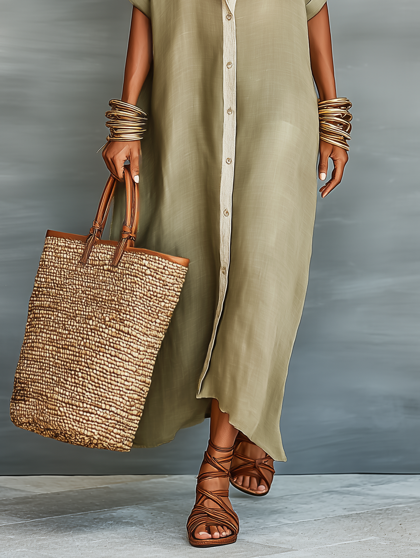Fashionable woman wearing a FJØRNA linen maxi dress, full-body shot showcasing the relaxed, flowy design and natural fabric.