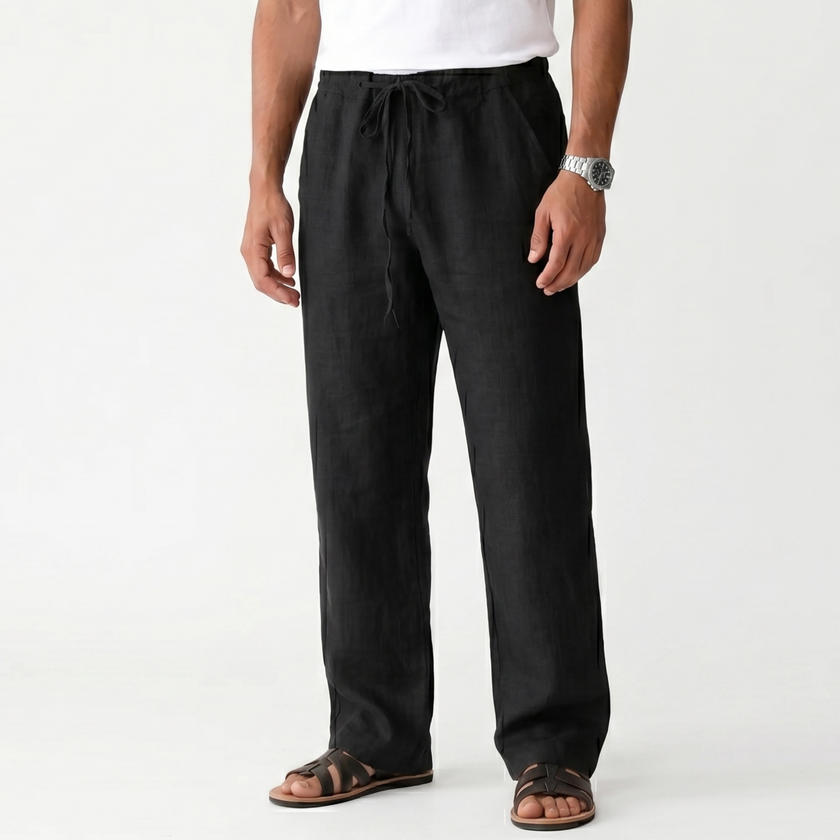 Men's breathable linen trousers by FJØRNA, featuring a relaxed fit and lightweight fabric ideal for warm weather.
