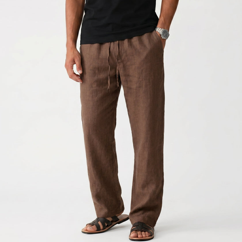 Men's FJØRNA breathable linen trousers with a relaxed fit, showing lightweight fabric and casual waistband on a neutral background.