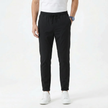 Men's stretchable comfort trousers by FJØRNA, showing a pair of men's pants with a relaxed fit and elastic waistband.