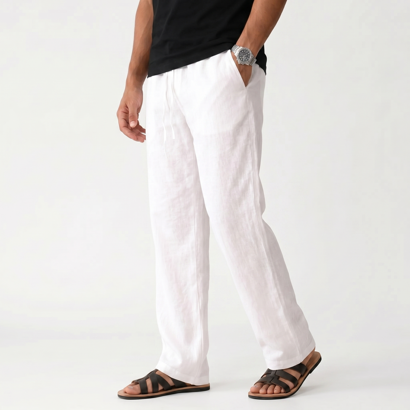Men's breathable linen trousers by FJØRNA, showcasing lightweight, comfortable fabric and relaxed fit in a neutral color.