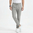 Men's stretchable comfort trousers by FJØRNA, casual men's pants with flexible fabric and a modern fit, shown in a neutral color.