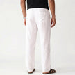 Men's breathable linen trousers by FJØRNA, showcasing lightweight, comfortable fit and relaxed style perfect for warm weather.