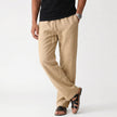 Men's breathable linen trousers by FJØRNA featuring a relaxed fit and natural fabric texture, perfect for casual and summer wear.