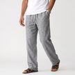 Men's breathable linen trousers by FJØRNA, showcasing lightweight, comfortable design perfect for casual wear.