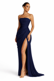 Navy women's strapless maxi dress with ruched waist by FJØRNA, featuring flowing fabric and a fitted bodice.