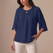 Navy blue pleated summer blouse for women by FJØRNA, casual top with a relaxed fit and soft fabric.