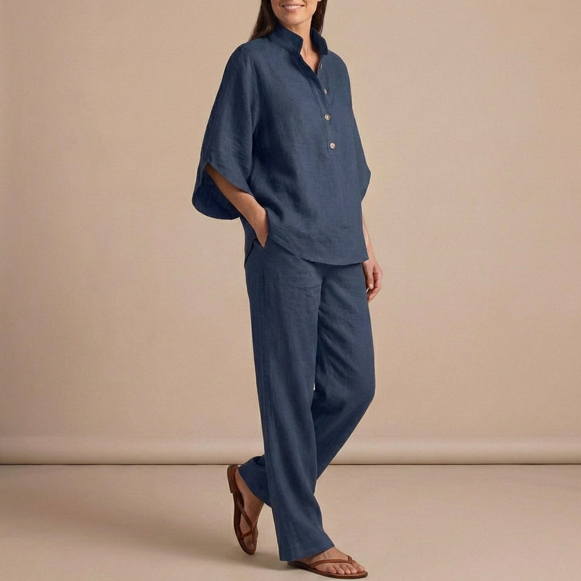 Navy blue woven two-piece relaxed shirt and wide-leg trouser set by FJØRNA, suitable for urban leisure and casual wear.