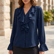 Navy blue women's summer blouse with V-neck, long sleeves, and ruffle details by FJØRNA, styled with a relaxed fit.