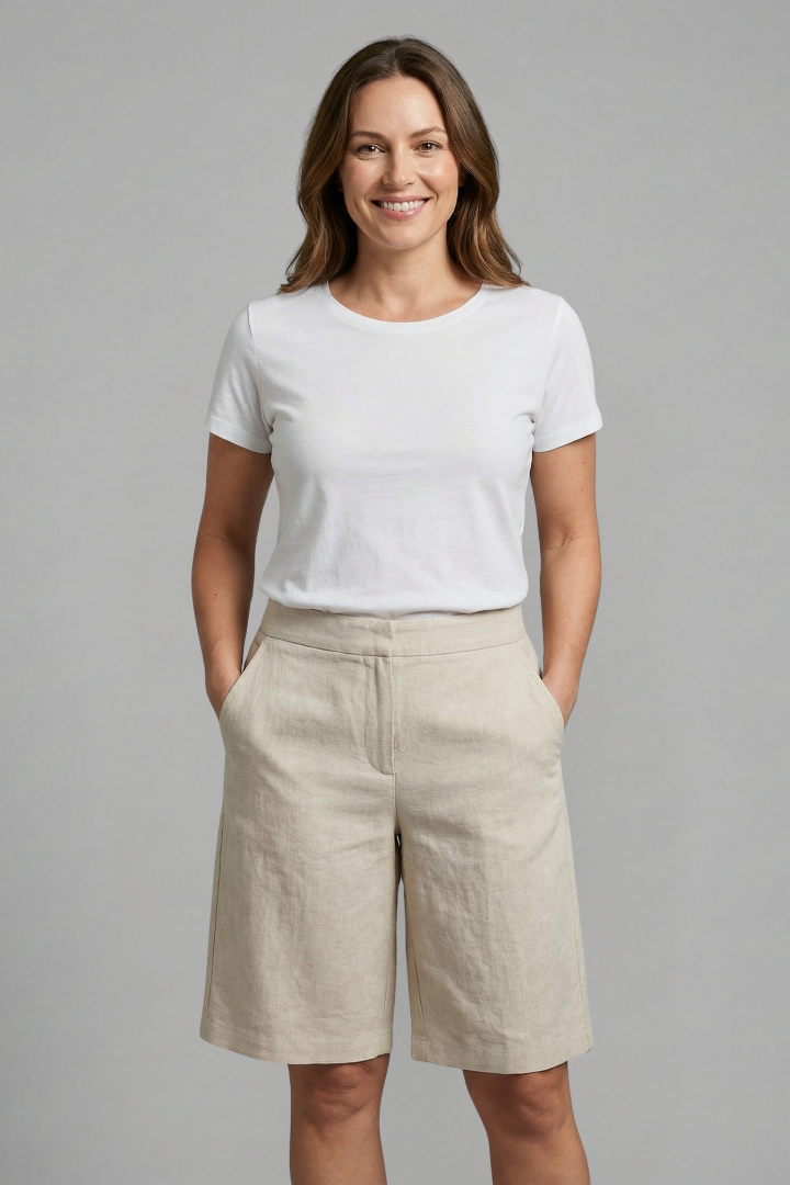 FJØRNA women’s high-waisted knee-length summer shorts with drawstring and pockets, lightweight and comfortable for warm weather.