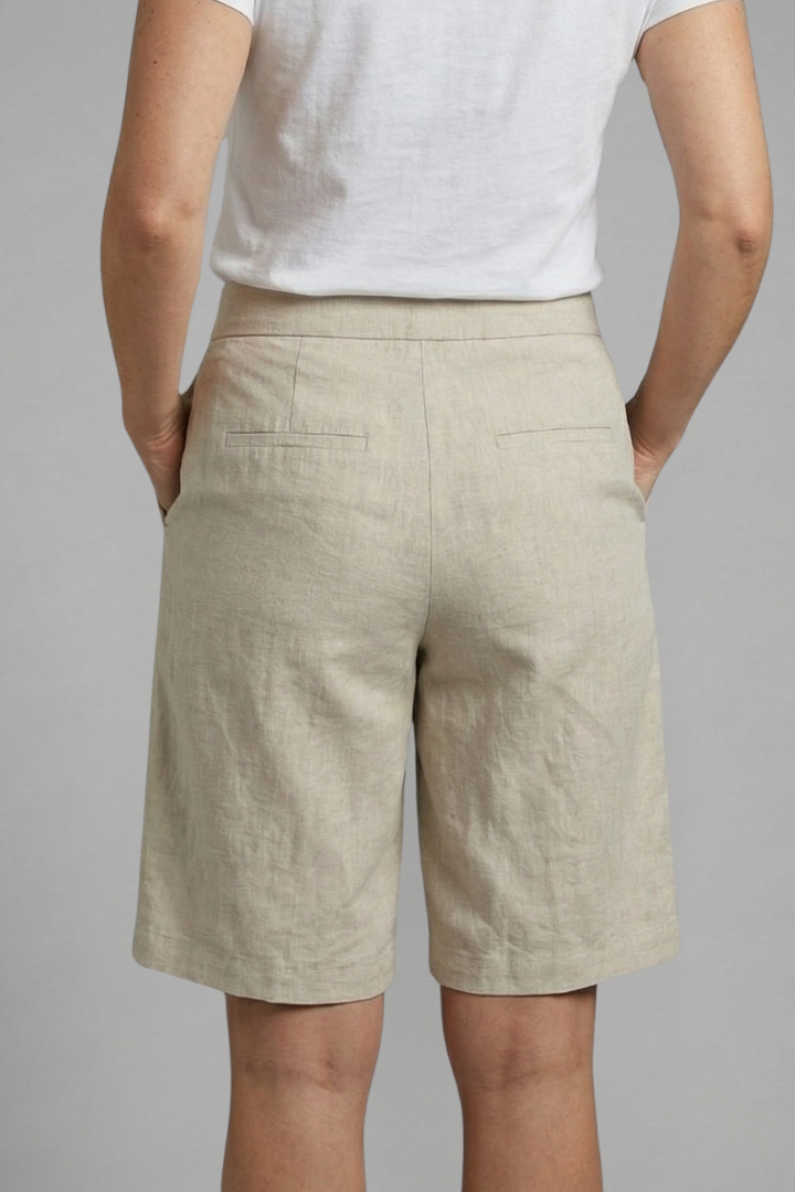 FJØRNA women's high-waisted summer shorts with knee length, drawstring waist, and side pockets, ideal for warm weather wear.