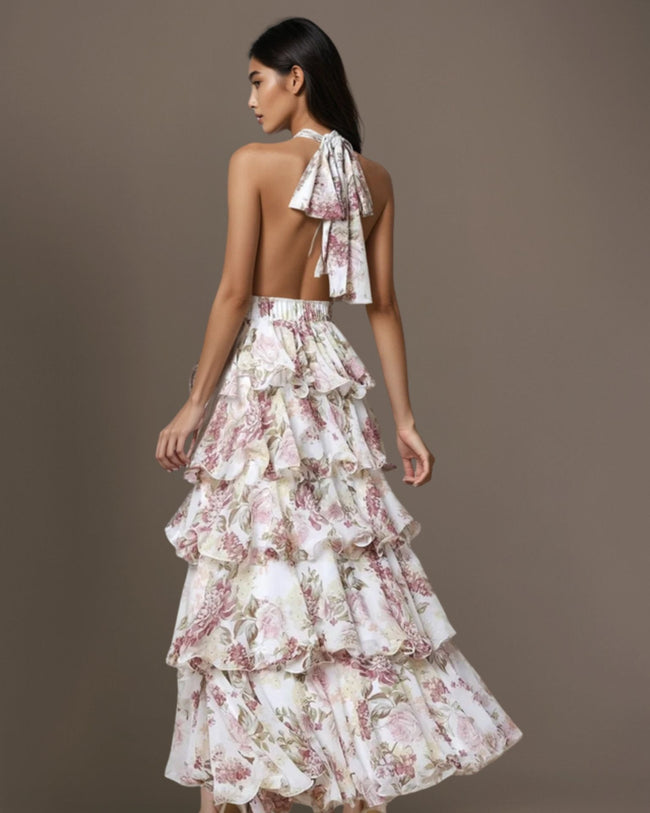 Offwhite FJØRNA floral halter maxi dress with tiered ruffles and waist detail, shown from the back view.