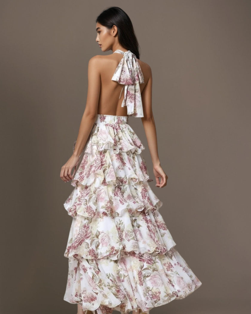 Offwhite FJØRNA floral halter maxi dress with tiered ruffles and waist detail, shown from the back view.