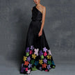 FJØRNA black floral one-shoulder casual wedding dress, perfect for beach and vacation days, with elegant floral pattern.