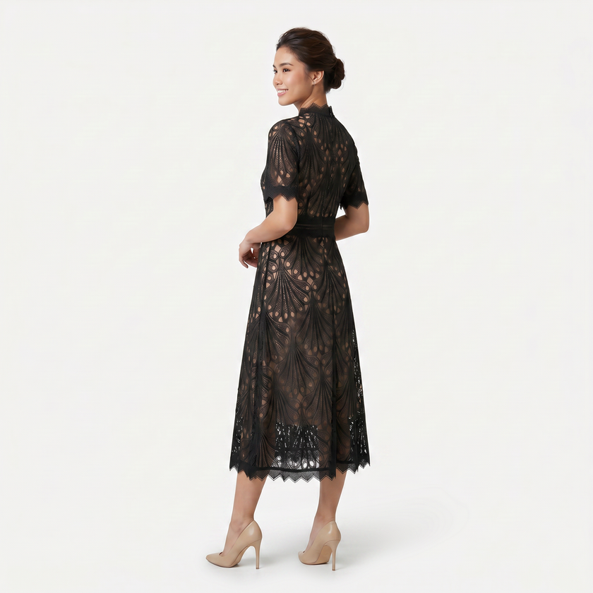 Women's elegant lace midi dress by FJØRNA featuring a high neck, refined cutwork detail, and a sleek silhouette.