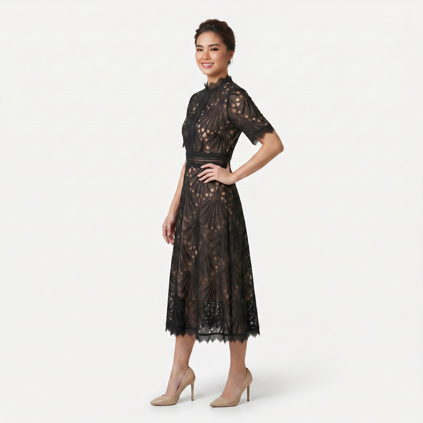 Women's elegant lace midi dress by FJØRNA featuring a high neck, refined cutwork detail, and a sleek silhouette.