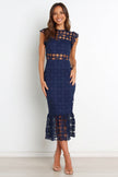 Navy Lauren Dress by FJØRNA, midi-length dress with a floral petal pattern, showcasing a stylish and comfortable design.