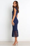 FJØRNA Lauren Navy Midi Dress featuring petal and pup detailing, elegant and flowy for versatile wear.