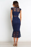 FJØRNA Lauren Navy Midi Dress with petal and pup details, elegant and flowy for stylish occasions.