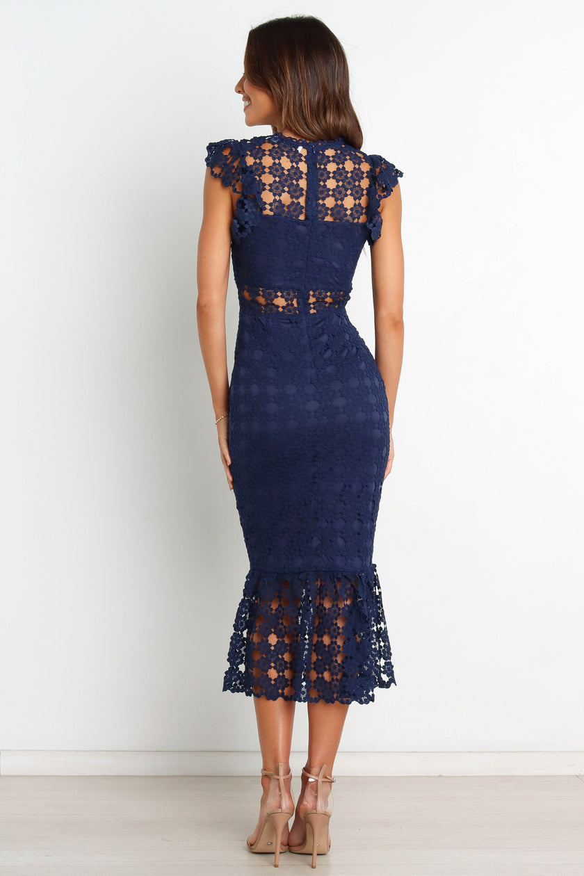 FJØRNA Lauren Navy Midi Dress with petal and pup details, elegant and flowy for stylish occasions.