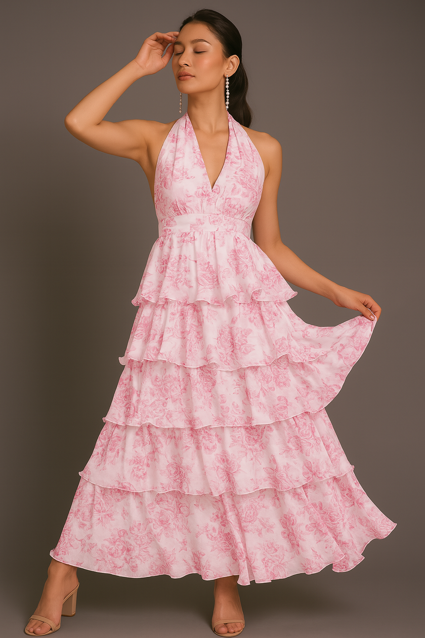 Pink FJØRNA halter floral tiered ruffle maxi dress with waist detail, featuring a flowing design and vibrant floral print.