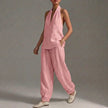 Pink FJØRNA lightweight two-piece halter V-neck suit with wide-leg trousers, featuring a stylish and comfortable design.