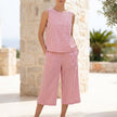 Pink FJØRNA women's two-piece co-ord set with striped pattern and pocket details, perfect for summer casual wear.
